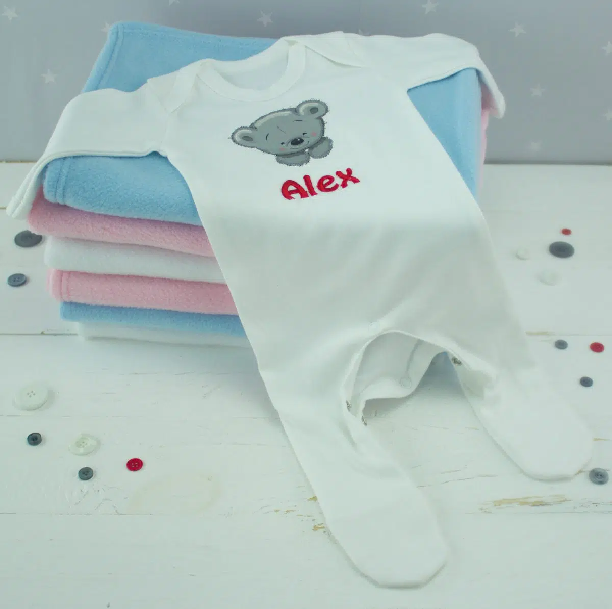 Personalised white baby sleepsuit